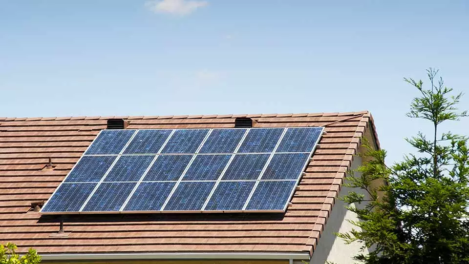 Solar panel installed on to roof of a home.