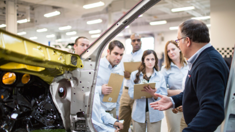 students visiting factory.