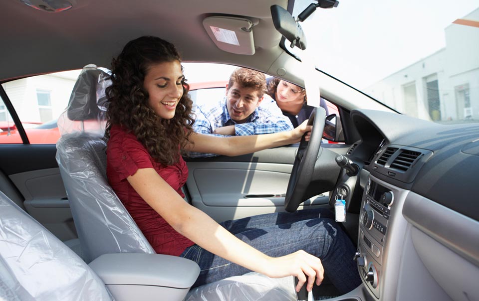 Teen driver testing out a new car.