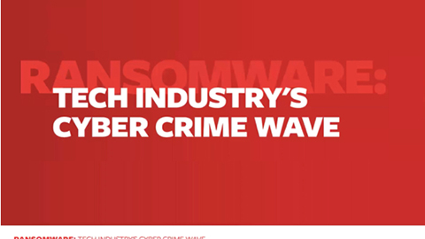 Text on red background, ransomware: tech industry's cyber crime wave.