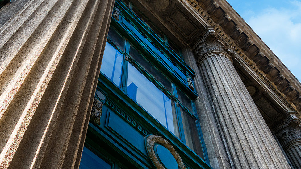 Closeup view of columns on a courthouse.