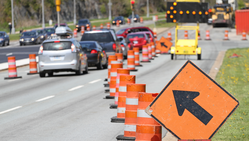 Cars driving through a work zone