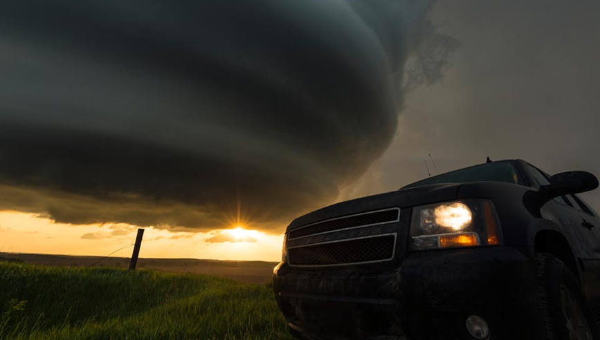 Truck staying safe while driving during tornadoes and hail.