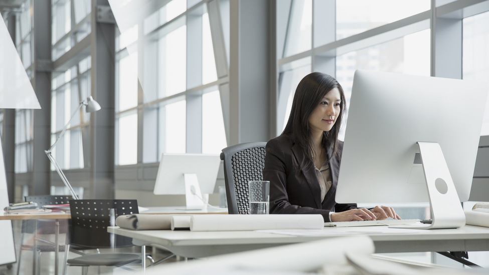 Businesswoman working at computer in office